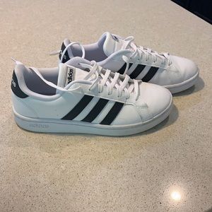 Adidas women’s white and black leather gym shoes